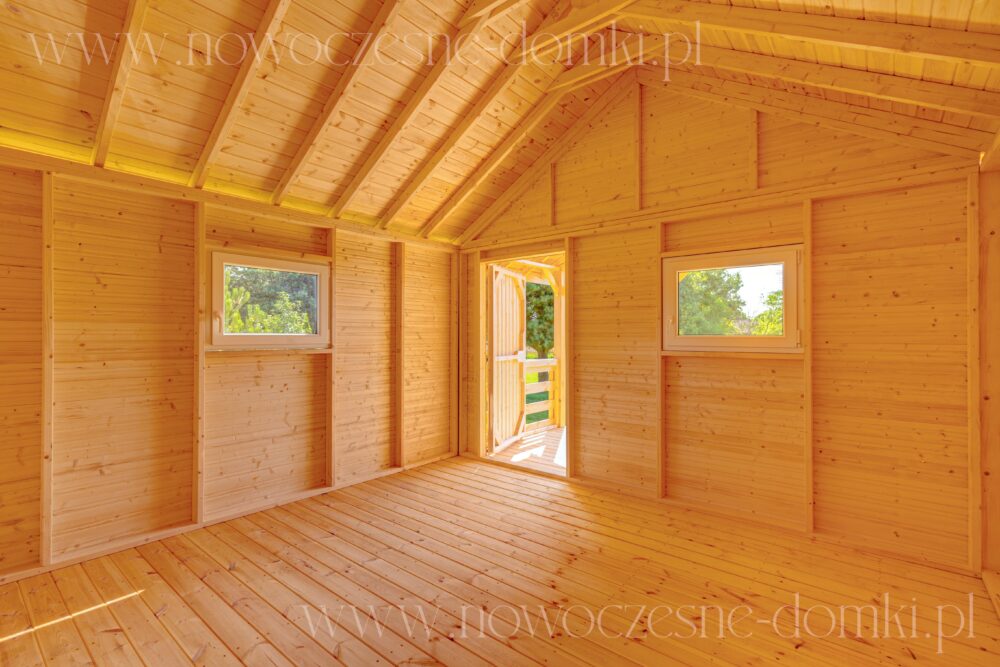 Nowoczesne wnętrze drewnianego domku - harmonia designu i natury.