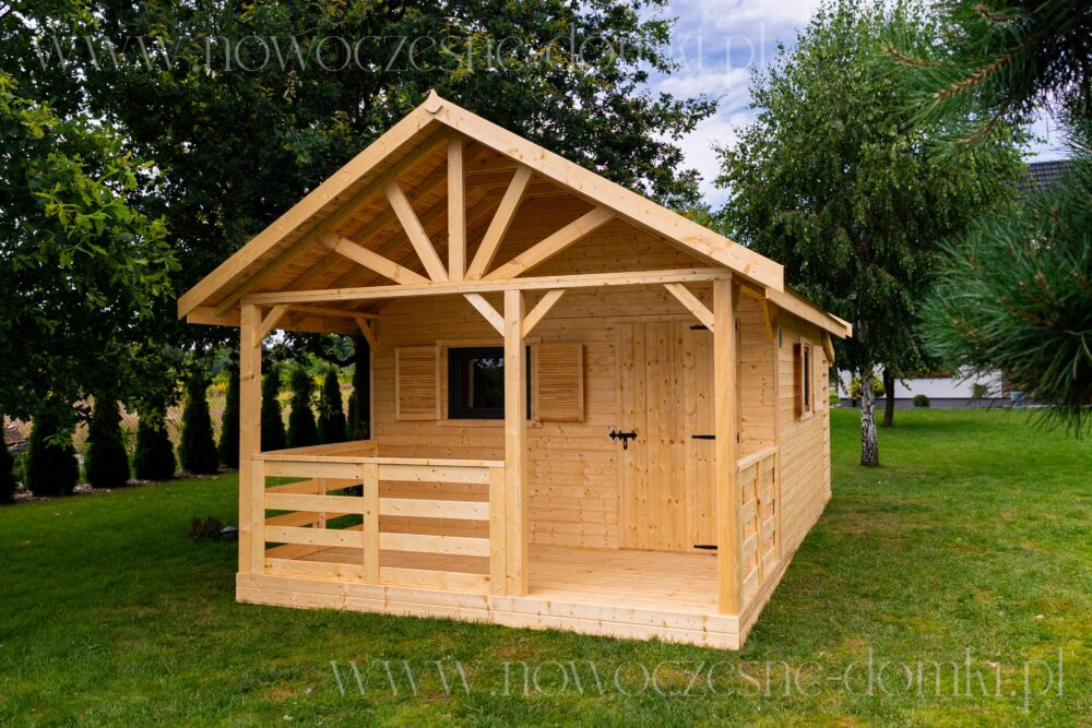 Drewniany domek na działkę w stylu wypoczynkowym - harmonijne połączenie natury i komfortu.