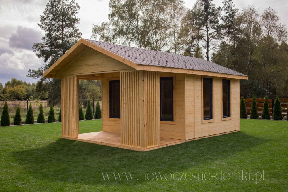 Wooden gazebo with a terrace and glazed windows - Harmony of nature and comfort.